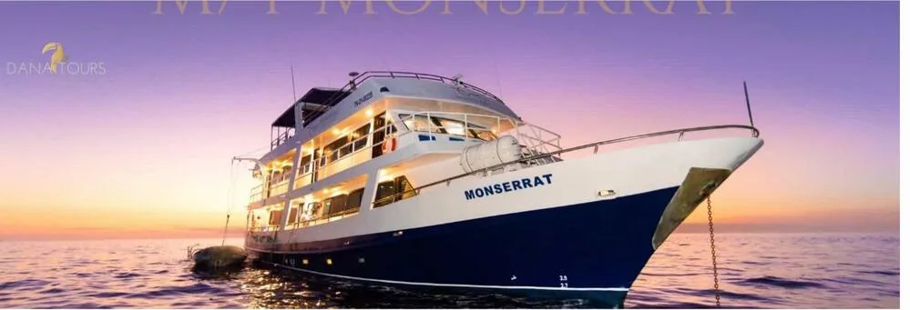 Monserrat yacht at sunset in the Galápagos