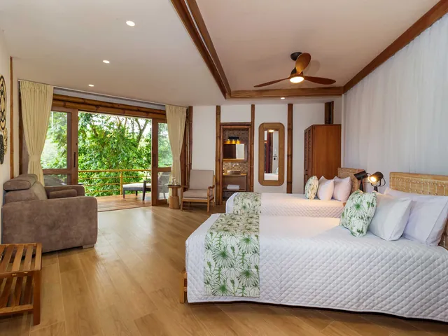 amazon la selva twin 640 - Dana Tours A stateroom at La Selva with two beds and a sitting area (photo: La Selva)