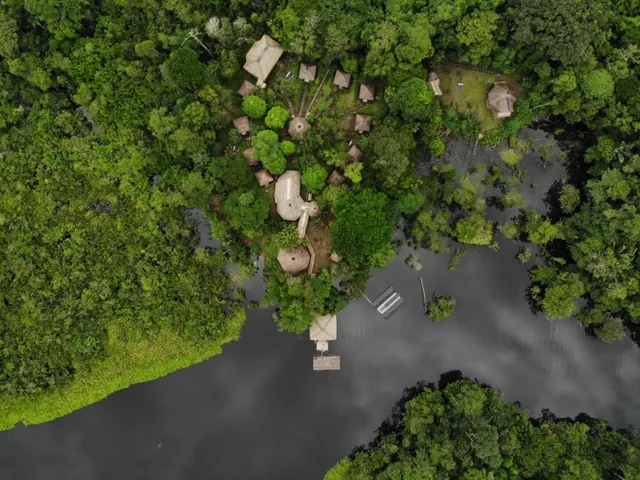 amazon sani hero 640 - Dana Tours Sani Lodge from the air: thatched cabins by the lagoon in the Ecuadorian Amazon, photographed by David Brito