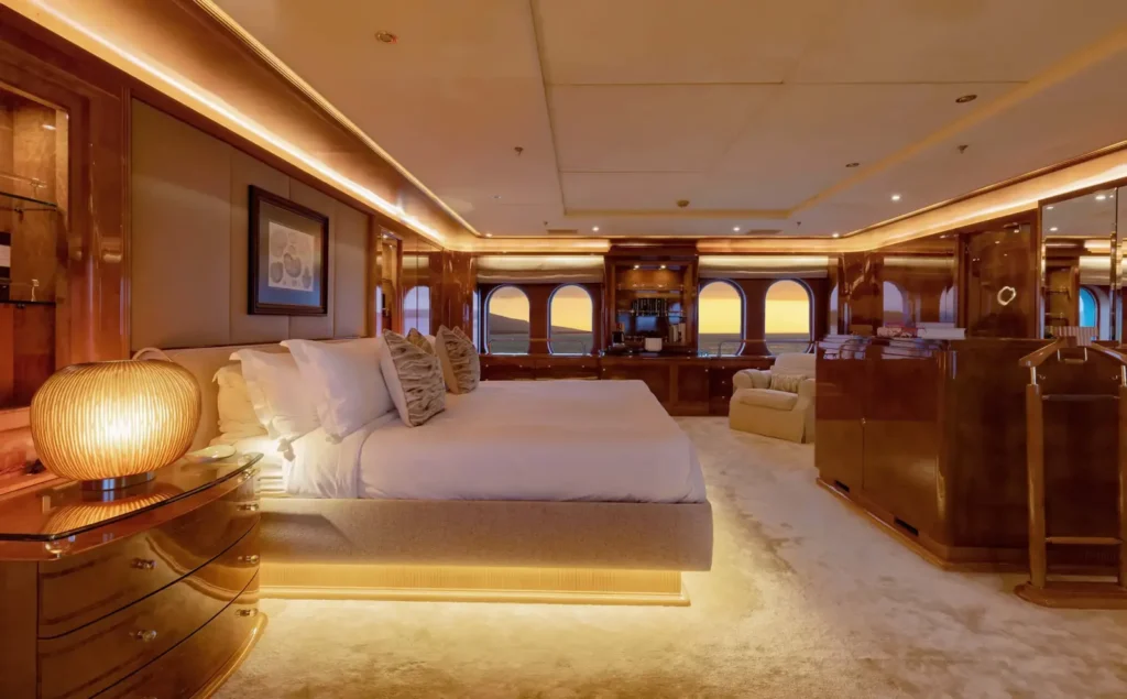 The 80 m² Owner’s Suite with a king bed on the Aqua Mare