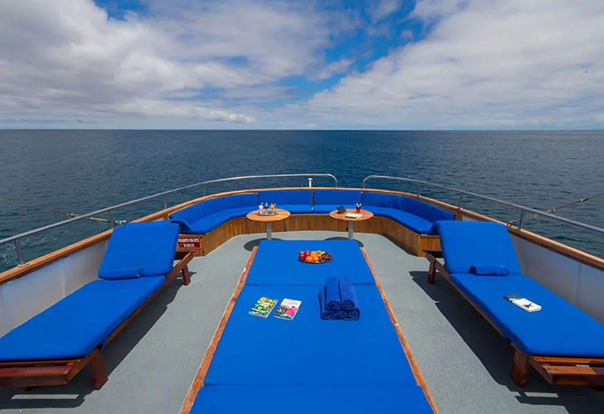 Sundeck with blue cushions on the Beluga