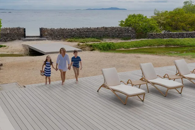 A family walking from Finch Bay to the beach (photo: Finch Bay Galápagos Hotel)