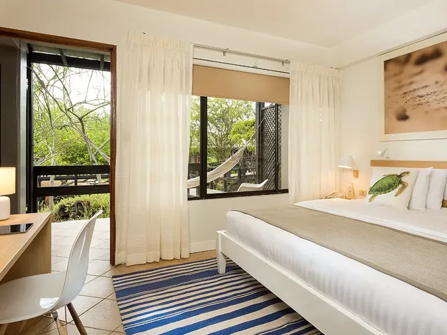 A Finch Bay Room with a king bed and garden views (photo: Finch Bay Galápagos Hotel)