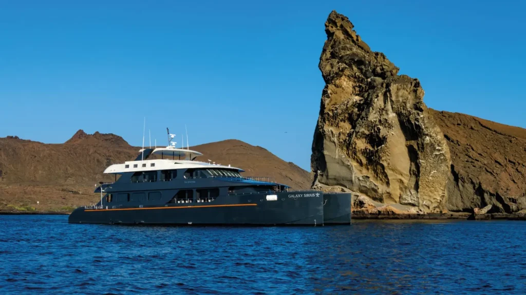 Galaxy Sirius catamaran off Pinnacle Rock, Bartolomé Island