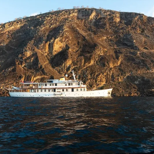 Grace yacht at anchor off Punta Vicente Roca, Galápagos