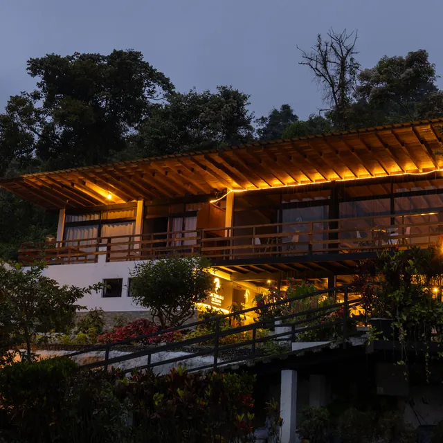 The main building of Las Terrazas de Dana lit up at night