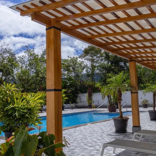 The swimming pool and its pergola at Las Terrazas de Dana