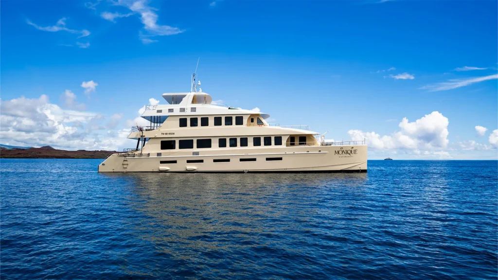 Monique catamaran at sea in the Galápagos