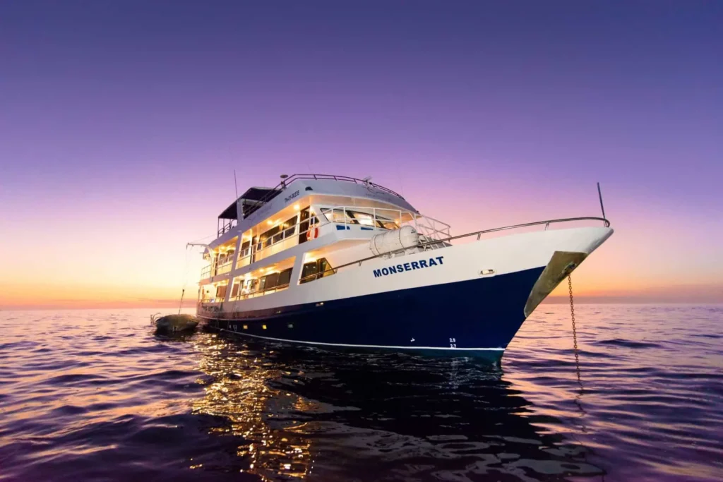 Monserrat yacht at sunset in the Galápagos Islands