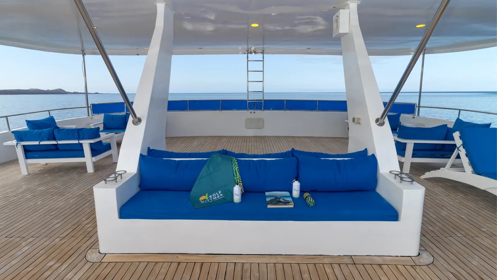 Sun deck with sofas and loungers on the Tip Top II