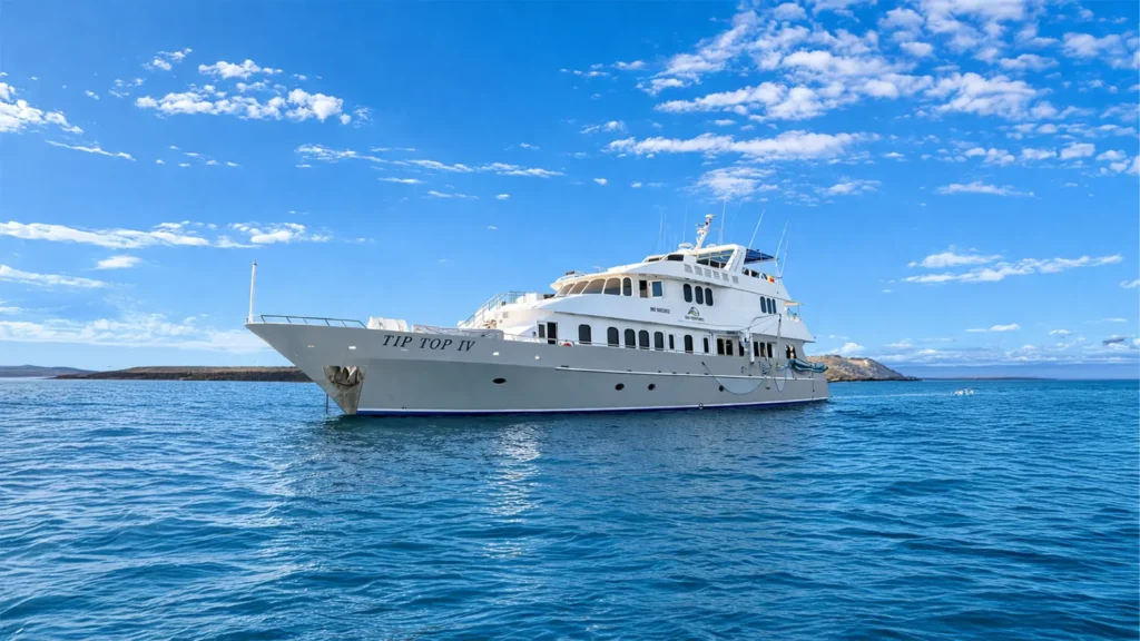 The Tip Top IV motor yacht at sea in the Galápagos