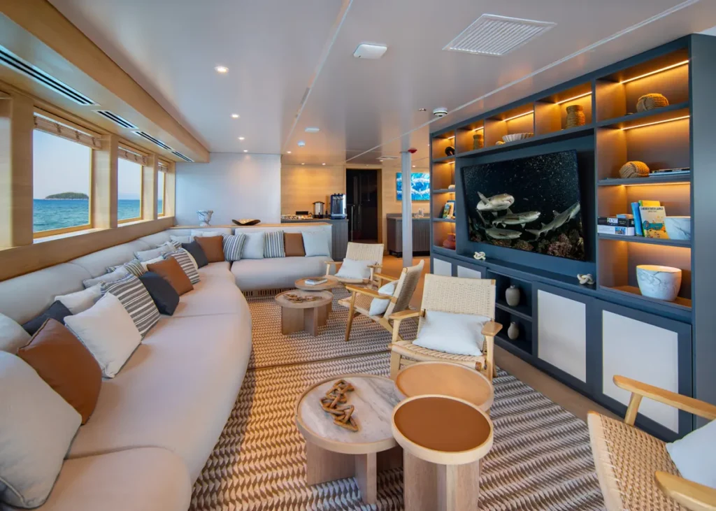 Lounge and library on the Tribute luxury yacht