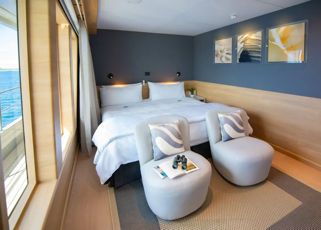Panorama Suite with ocean-view windows on the Tribute
